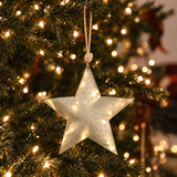 Suspension de Noël Étoile Métal 16 cm, argenté, photo d'ambiance, Sia Deco