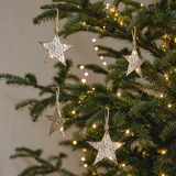 Suspension de Noël Étoile Métal 10 cm argenté en fer, photo d'ambiance
