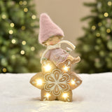 Christmas Figurine Girl with Pink Hat on LED Snowflake