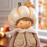Figurine de Noël Garçon Pumpkin 19 cm crème en polyrésine, décoration de Noël à poser, focus produit, Sia Deco