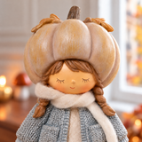 Figurine de Noël Fillette Pumpkin 19 cm crème en polyrésine, décoration de Noël à poser, focus produit, Sia Deco