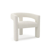 Fauteuil MILA en tissu bouclette crème au design sculptural, vue de trois quarts sur fond blanc, Sia Deco
