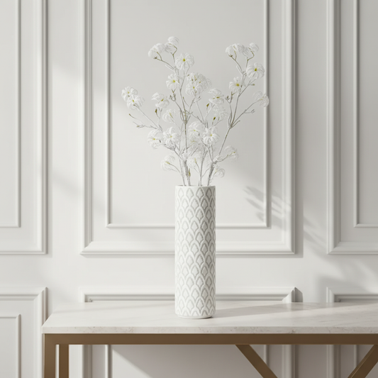 Tiges de Clématites enneigées et vase unicorn Sia