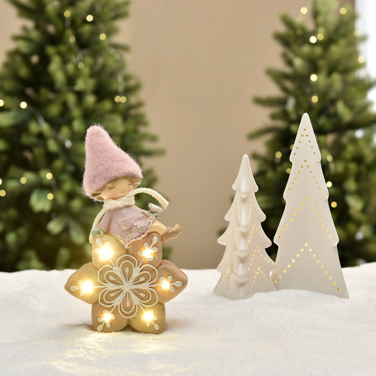Figurine de Noël Fillette à bonnet rose sur Flocon LED