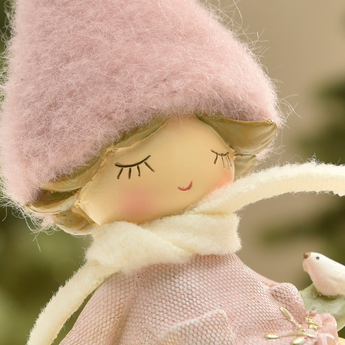 Figurine de Noël Fillette à bonnet rose sur Flocon LED