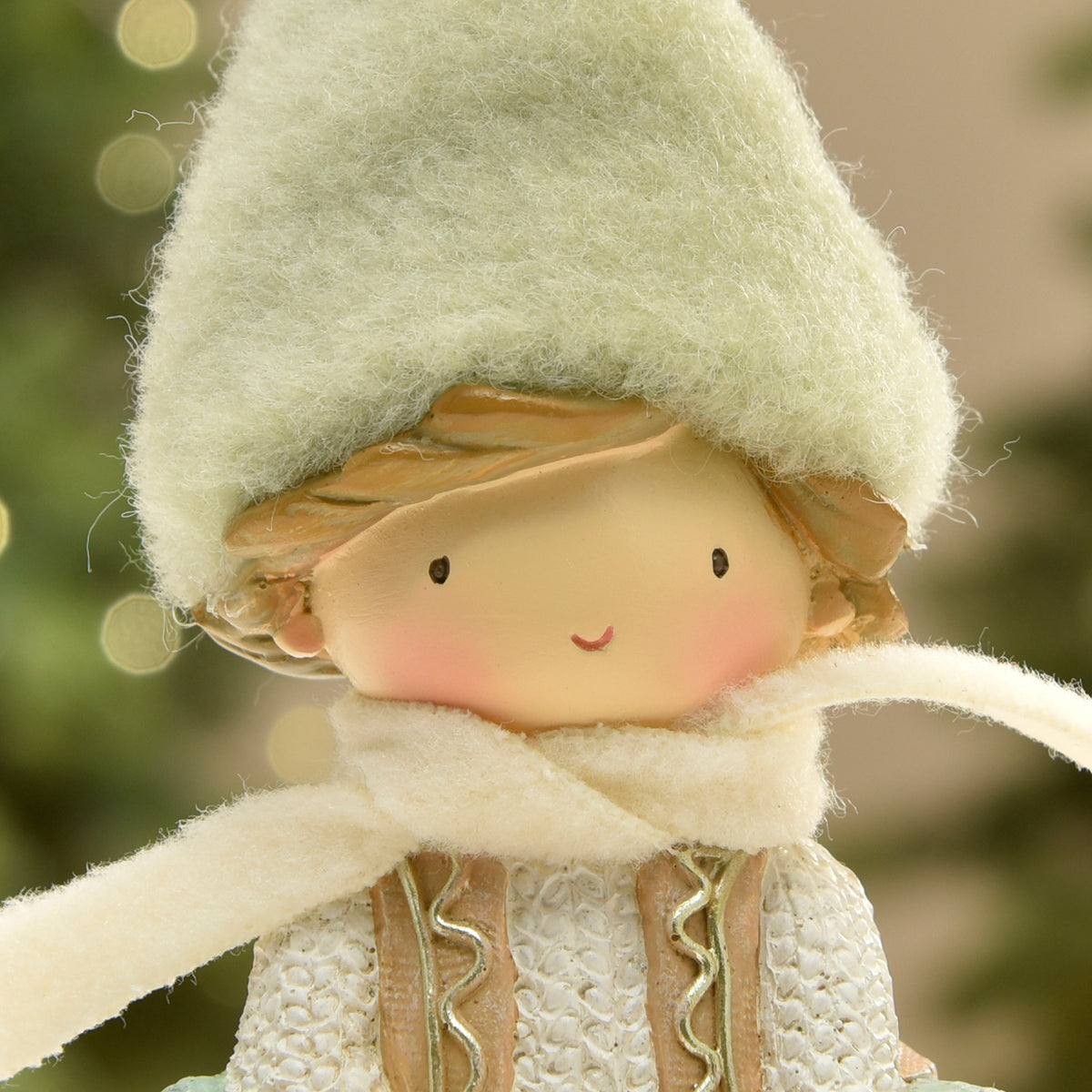 Figurine de Noël Garçon à bonnet vert sur Flocon LED