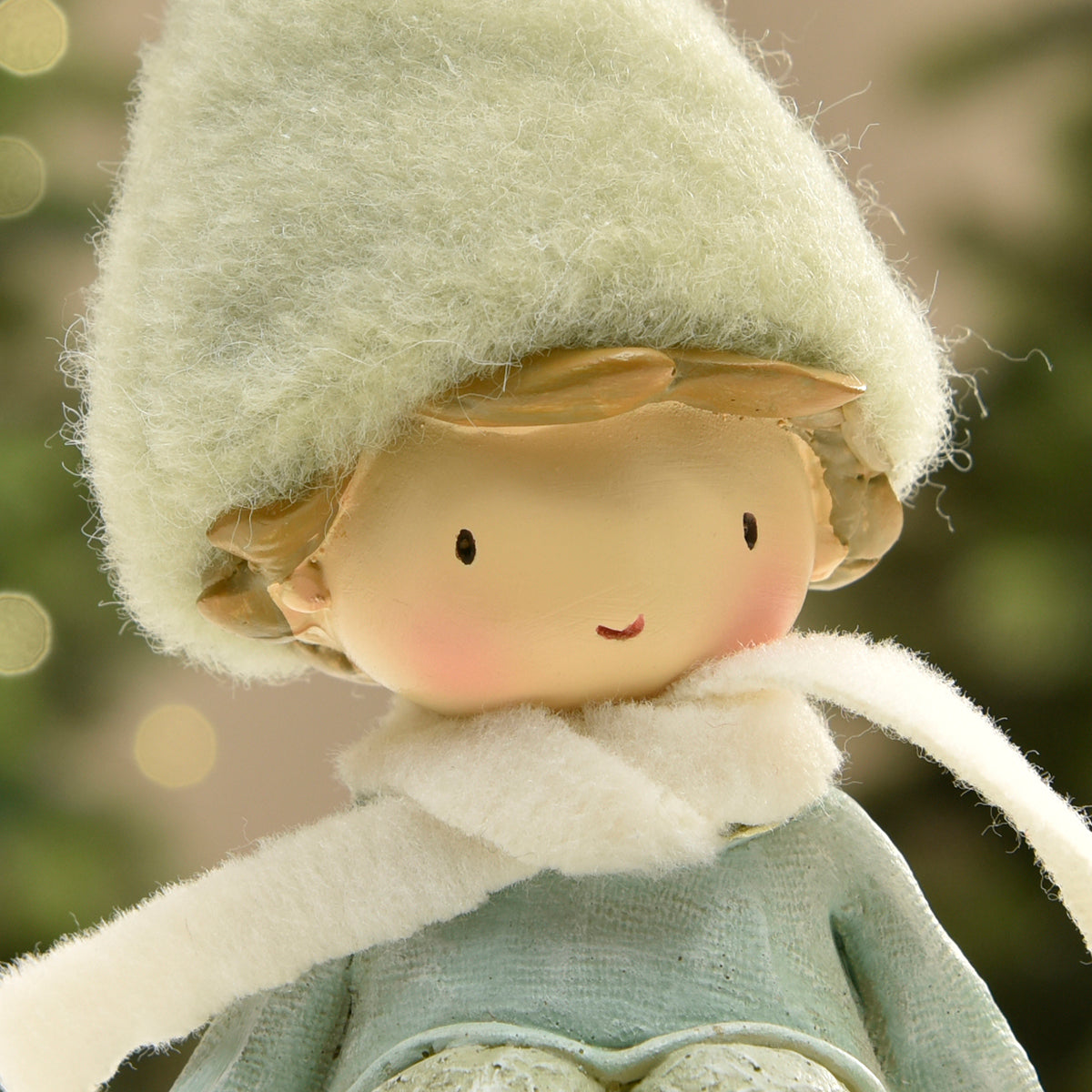 Figurine de Noël Garçon à bonnet vert sur Flocon LED