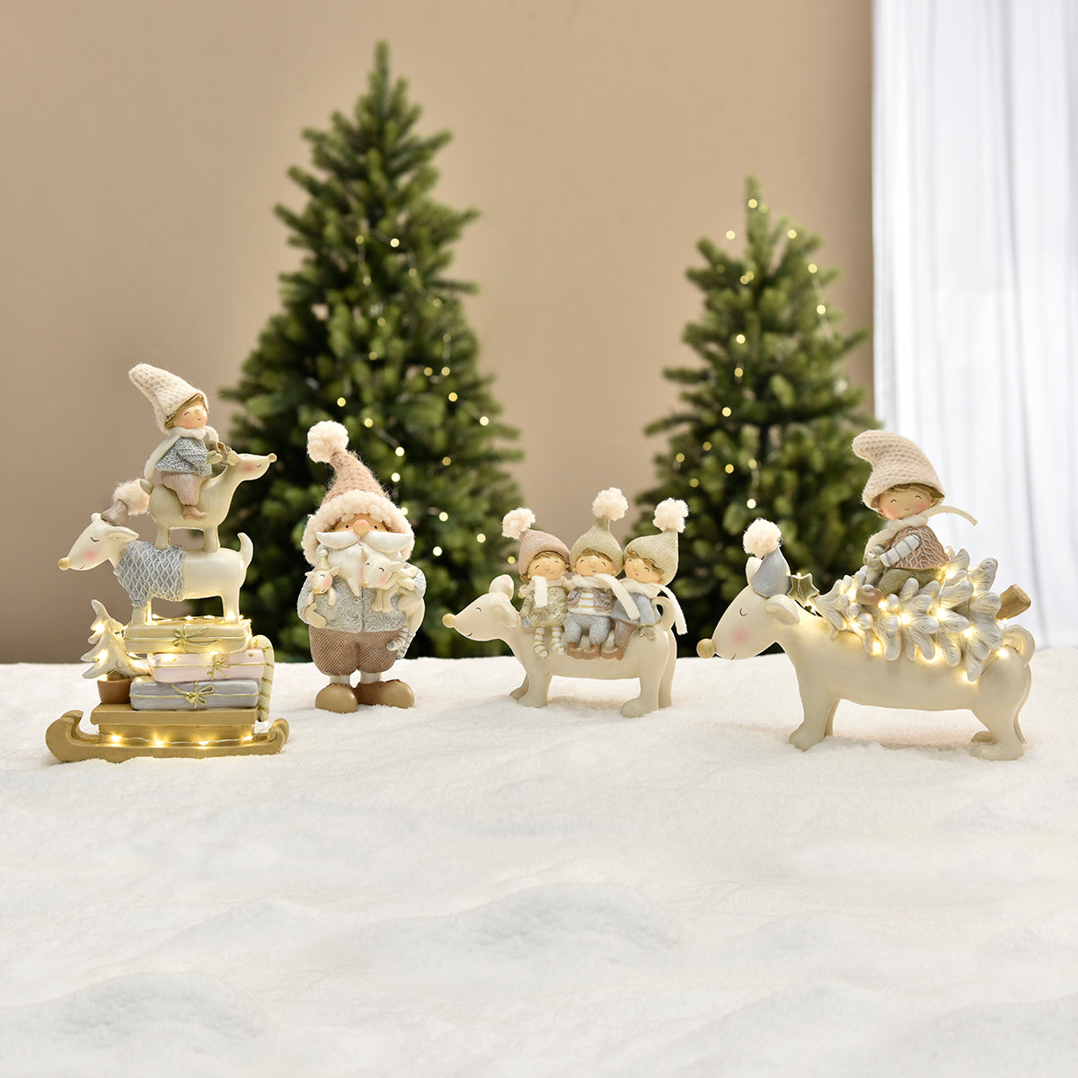 Figurine de Noël Enfant sur renne Pastel LED
