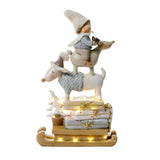 Pastel Christmas Figurine Child on Reindeer