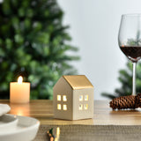 Piccola statuetta di chalet natalizio con tetto dorato