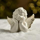 Winged Angel Figurine Holding Its Chin