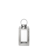 Lanterne en métal brillant argenté avec anse arrondie, dessus plat et avec fenêtre en verre transparent