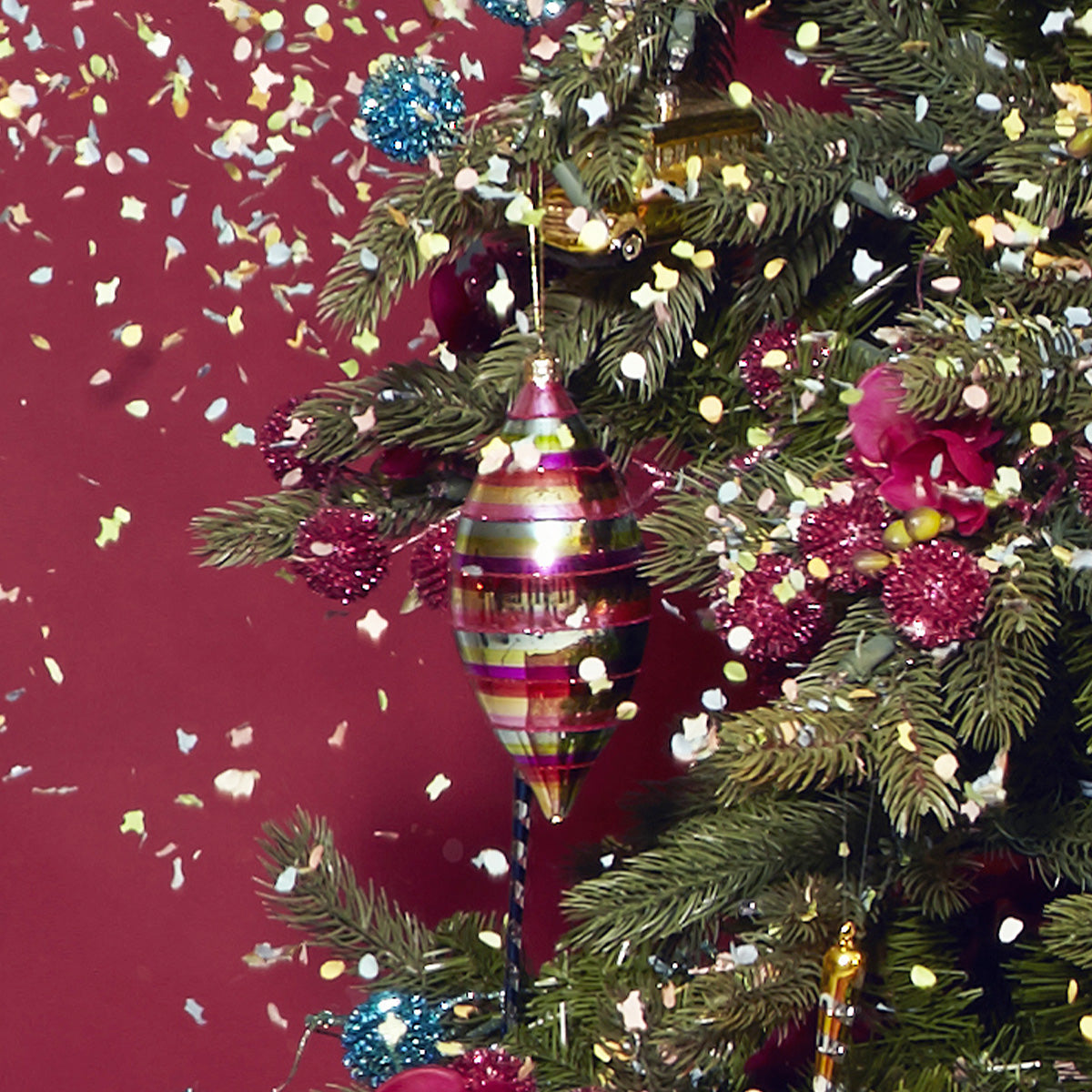 Boule de Noël Pop Allongée à Rayures et Paillettes Rouges