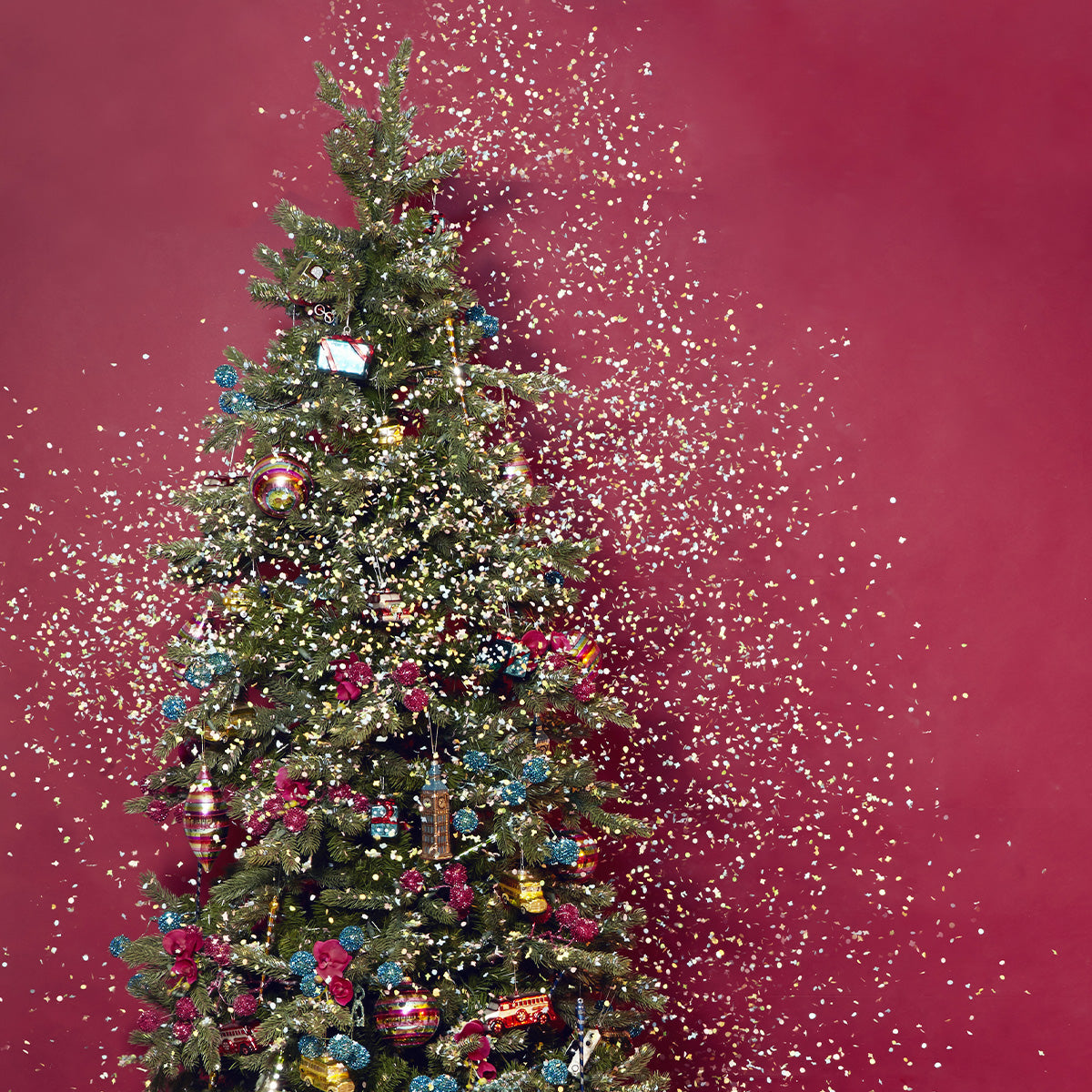 Palla di Natale allungata con strisce rosse e glitter